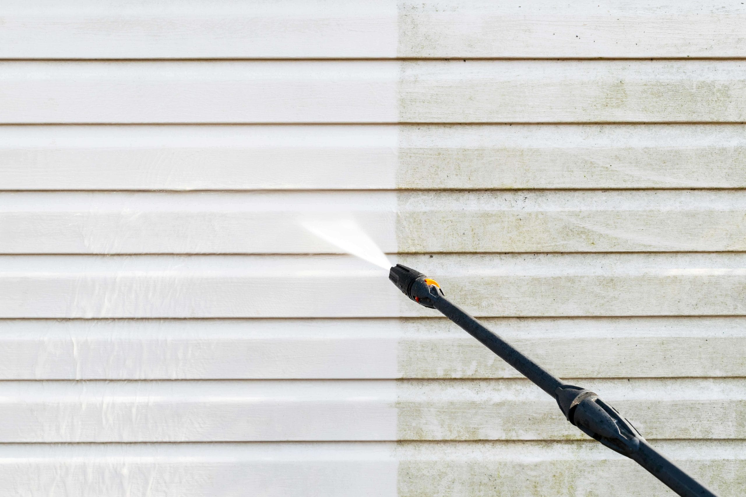 Residential exterior power washing in New Orleans, LA: Before and after transformation.